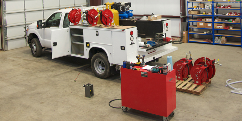 Sage Oil Vac customer LubeBuilder Systems being installed on a work truck